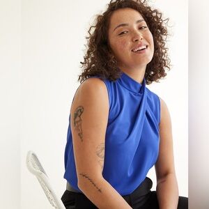 Reitman’s Sleeveless Mock-Neck Draped Blouse